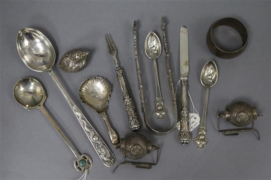 Mixed silver including a pair of Georgian sugar tongs, pair of novelty condiments, a chick pepperette, Georgian caddy spoon etc.